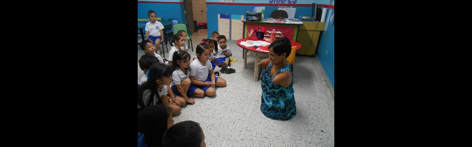 Speaking to 3rd grade class at  Holy Cross Bilingual School in Honduras 2014